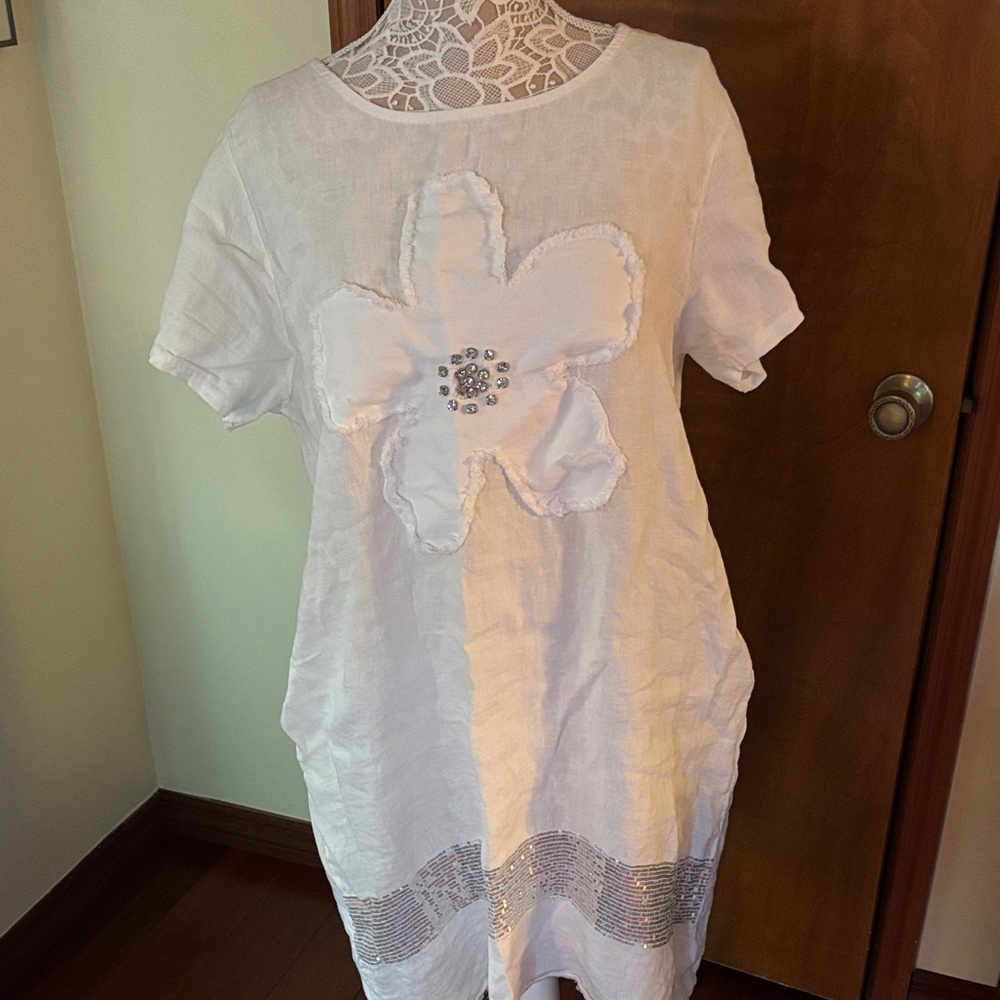 White Dress with Floral Appliqué and Silver Accents
